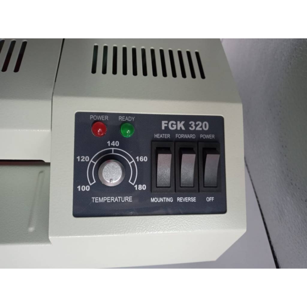 Regulador de temperatura y botón de reversa